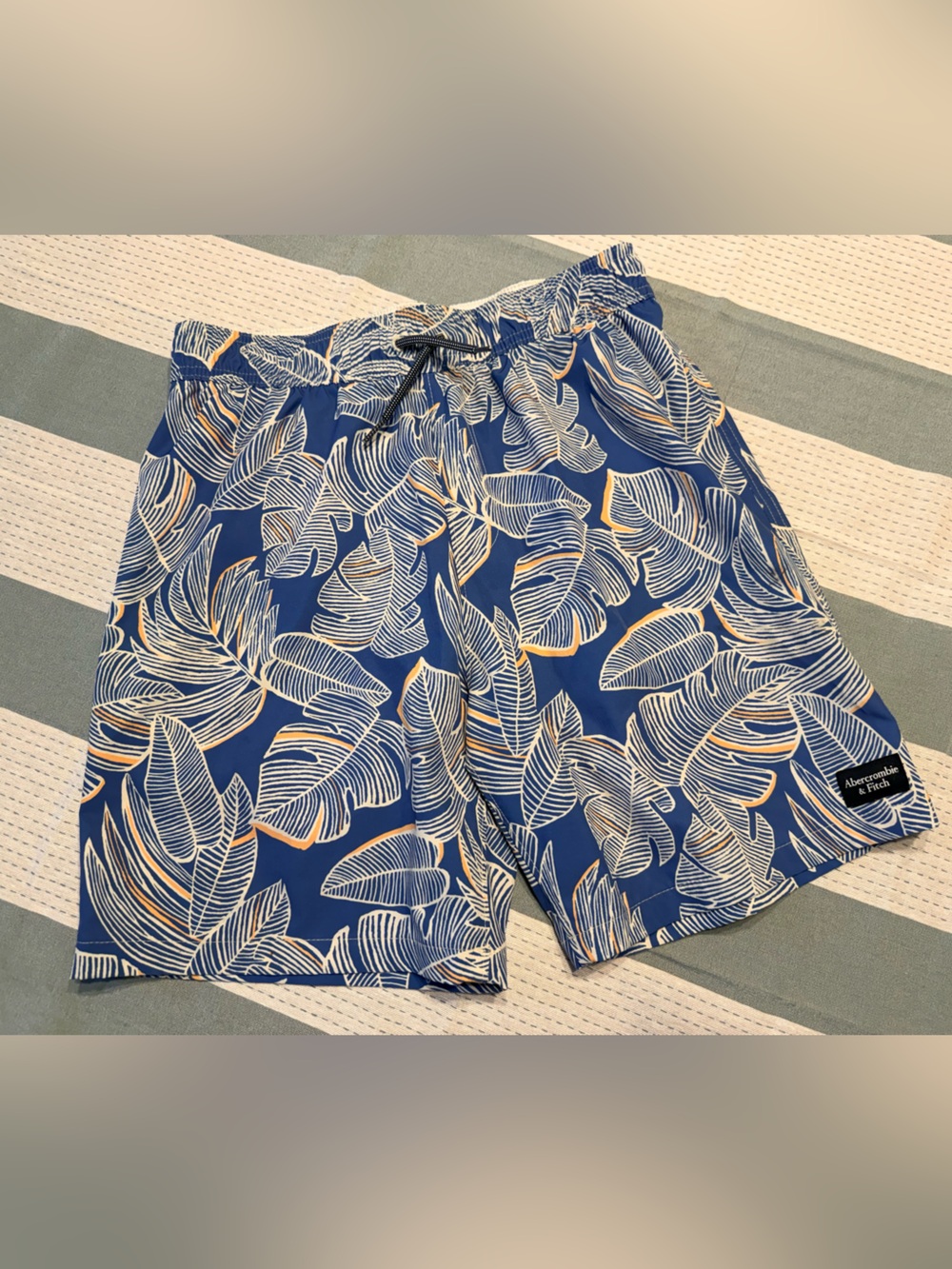 abercrombie kids Blue and White Leaf-Print Swim Trunks with Tan Accents